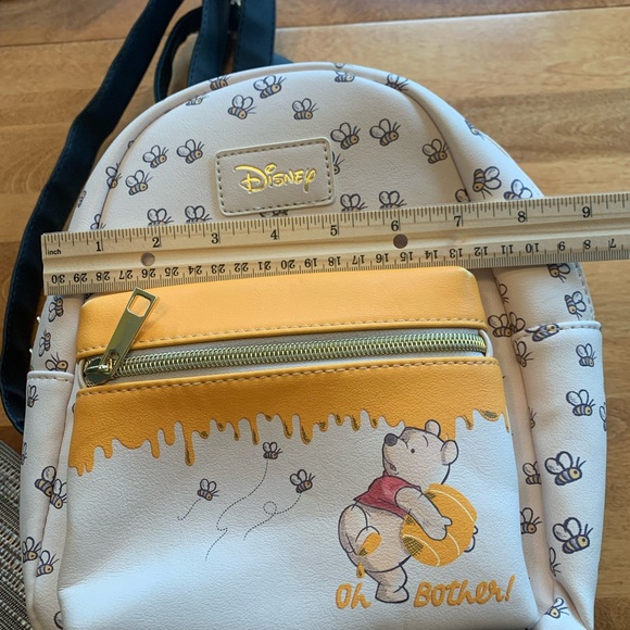 Disney Loungefly mini. Pooh bear. New without tags. Never used